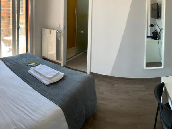 Mambo Suites : photo 2 de la chambre chambre simple avec salle de bains privative