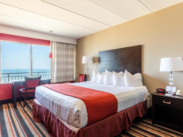 Sandcastle Resort : photo 1 de la chambre chambre lit king-size avec douche accessible en fauteuil roulant - adaptée aux personnes à mobilité réduite