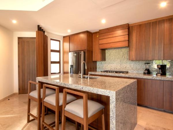 Bohari Palmilla : photo 5 de la chambre appartement - vue sur jardin