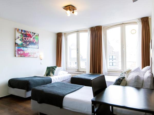 Quentin Arrive Hotel : photo 8 de la chambre chambre triple avec salle de bains commune