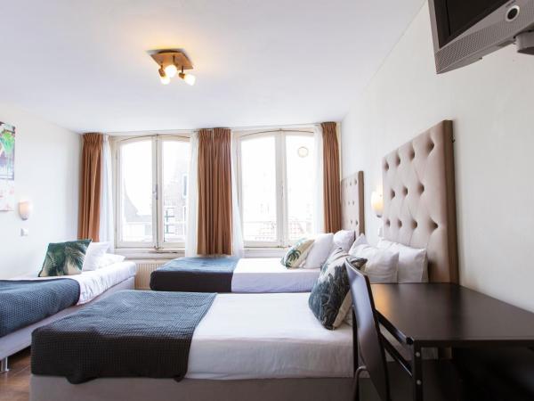 Quentin Arrive Hotel : photo 7 de la chambre chambre triple avec salle de bains commune