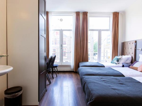 Quentin Arrive Hotel : photo 6 de la chambre chambre quadruple avec salle de bains commune