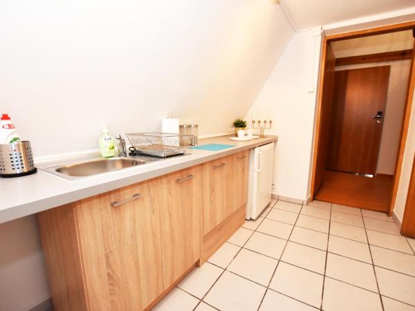 DUKES Hostel - Pokoje prywatne, RYNEK : photo 9 de la chambre chambre familiale avec salle de bains commune