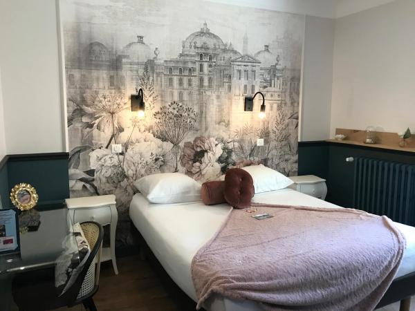 Le Grand Hôtel Mont Dore : photo 1 de la chambre chambre double - vue sur jardin