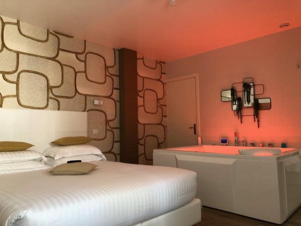 Hotel Villa Rose : photo 8 de la chambre cottage avec bain à remous