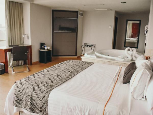 Hotel Portobelo : photo 3 de la chambre suite deluxe avec baignoire spa