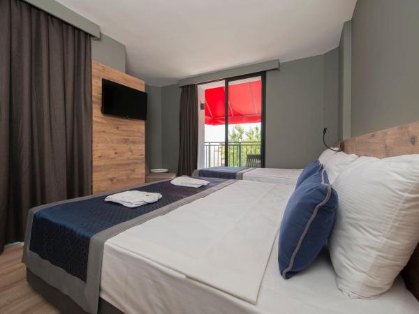 Pure Blanche Hotel : photo 3 de la chambre chambre triple deluxe - vue sur mer