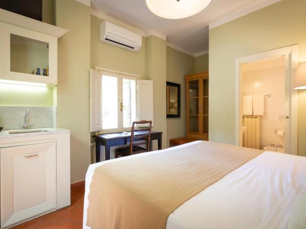 Villino Fiorentino : photo 8 de la chambre chambre double - vue sur jardin - annexe