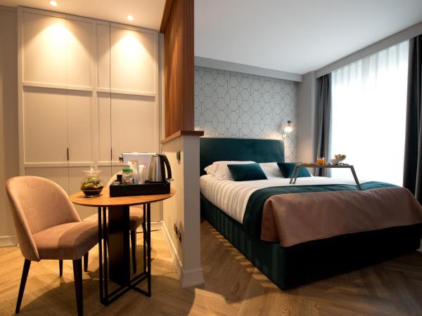 Duomo Hotel & Apartments : photo 4 de la chambre chambre lit king-size deluxe