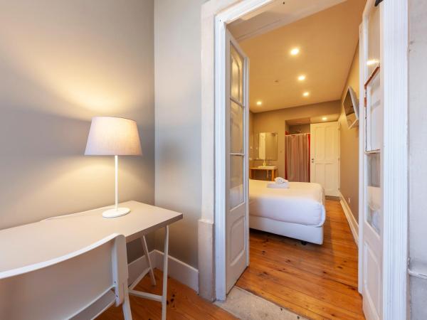 The Bridge : photo 1 de la chambre chambre triple avec salle de bains commune