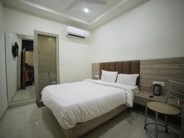 Hotel Shri Ram Residency : photo 3 de la chambre chambre double deluxe (2 adultes + 1 enfant)