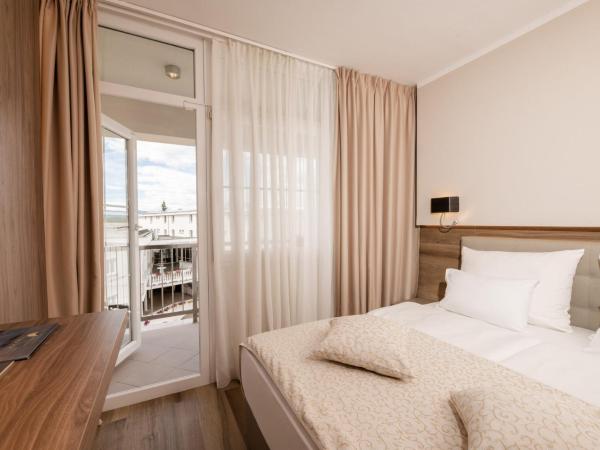 Hotel Malin : photo 4 de la chambre chambre familiale atrium