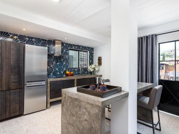 Cuale : photo 2 de la chambre appartement avec balcon