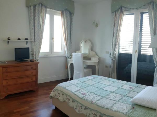 Villa Luce B&B : photo 1 de la chambre suite junior avec terrasse