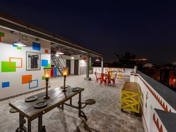 House of Backpackers : photo 9 de la chambre chambre triple avec salle de bains privative