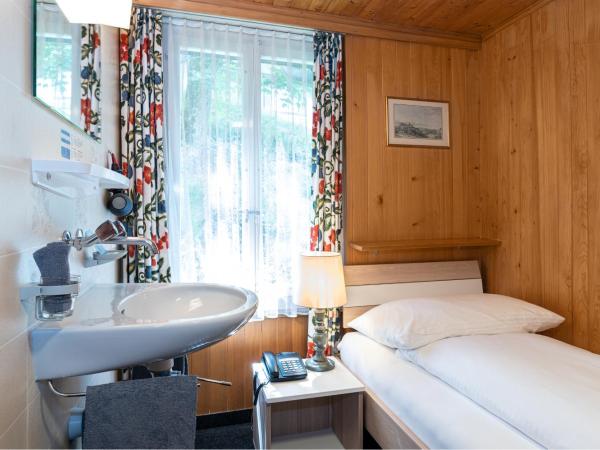 Basic Rooms Jungfrau Lodge : photo 3 de la chambre chambre simple basique plus avec douche et toilettes communes