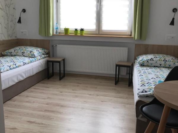 Kathia Pokoje Gościnne : photo 10 de la chambre chambre lits jumeaux avec salle de bains
