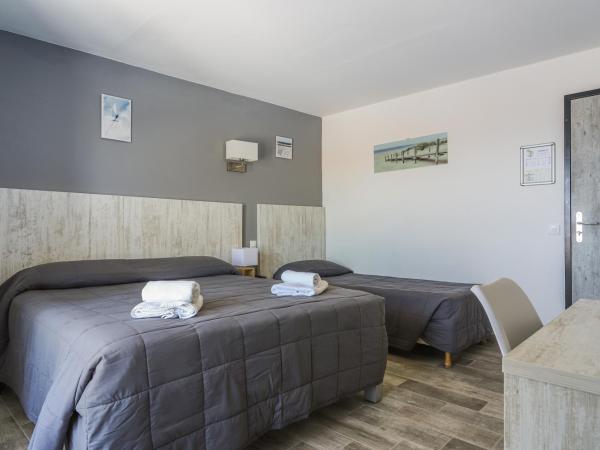 Hotel Les Palmiers En Camargue : photo 6 de la chambre chambre triple supérieure - vue sur mer