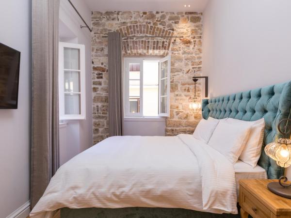 Acanthus blue : photo 1 de la chambre chambre double supérieure - vue sur jardin