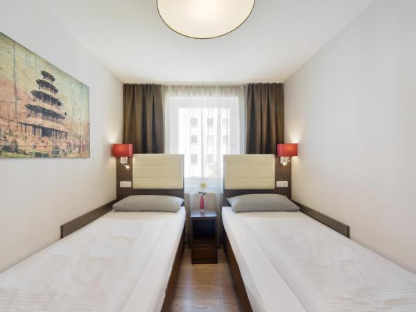 KOOS Hotel&Apartments - City Aparthotel : photo 5 de la chambre appartement 4 pièces