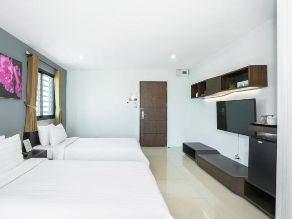 De Botan Srinakarin Hotel & Residence : photo 2 de la chambre chambre lits jumeaux deluxe