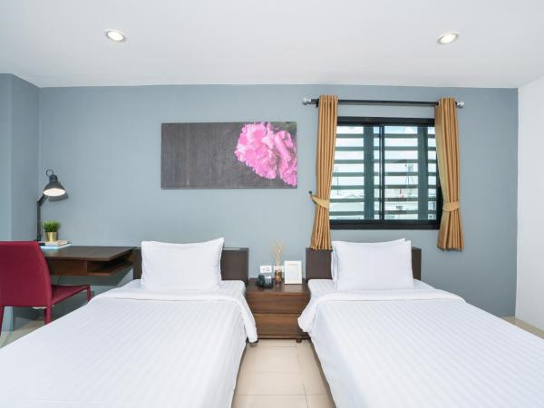 De Botan Srinakarin Hotel & Residence : photo 4 de la chambre chambre lits jumeaux deluxe