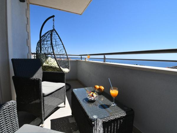 Dubrovnik Icy Guest House : photo 1 de la chambre studio avec balcon et vue sur la mer