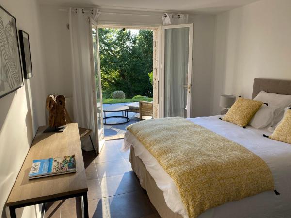 A Casa Bianca : photo 3 de la chambre chambre lit queen-size - vue sur piscine