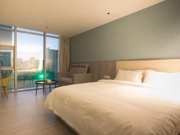 Beijing Saga Hotel : photo 1 de la chambre chambre lit king-size supérieure