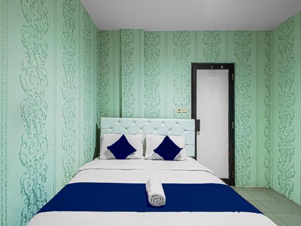 Bungur Inn Syariah : photo 3 de la chambre chambre lit queen-size