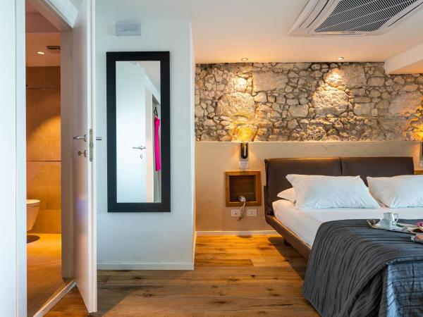 Re Dionisio Luxury Suites : photo 3 de la chambre suite junior