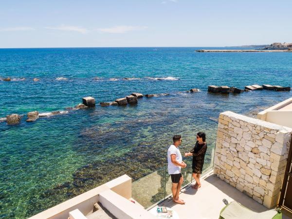 Re Dionisio Luxury Suites : photo 3 de la chambre suite penthouse