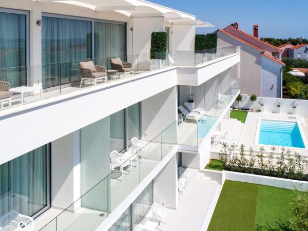 B&B Demar Residence & Dependance : photo 1 de la chambre chambre de luxe avec terrasse - vue sur mer