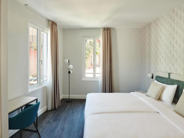 Vista Lakefront Boutique Hotel : photo 5 de la chambre chambre double lit king-size jardin
