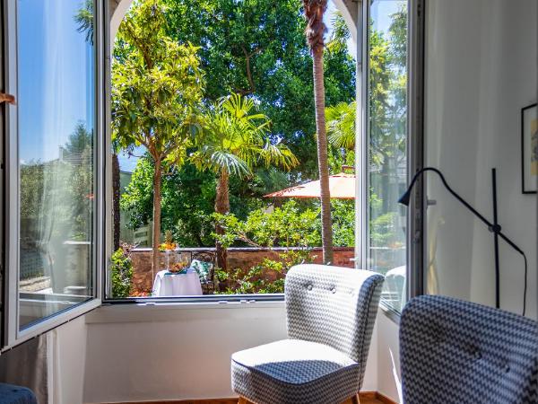 Villa Muralto Rooms & Garden : photo 8 de la chambre suite familiale deluxe