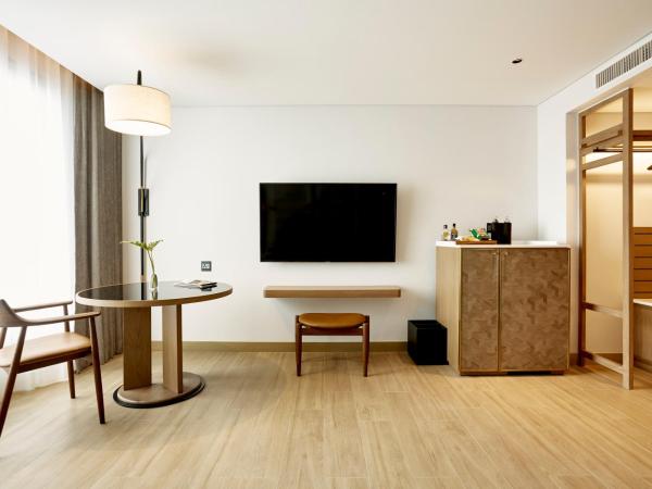 Montien Hotel Surawong Bangkok : photo 2 de la chambre chambre lit king-size deluxe