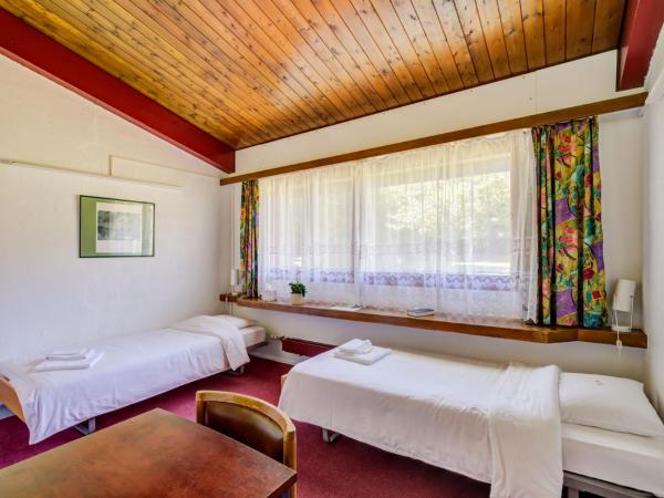 John Knox International Center : photo 1 de la chambre chambre lits jumeaux avec douche