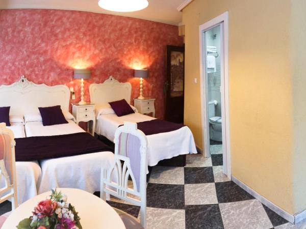 Hostal Goya Suites : photo 4 de la chambre chambre quadruple