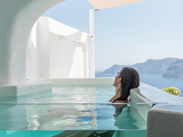 Aspaki by Art Maisons : photo 4 de la chambre suite exclusive avec bain à remous - vue sur volcan