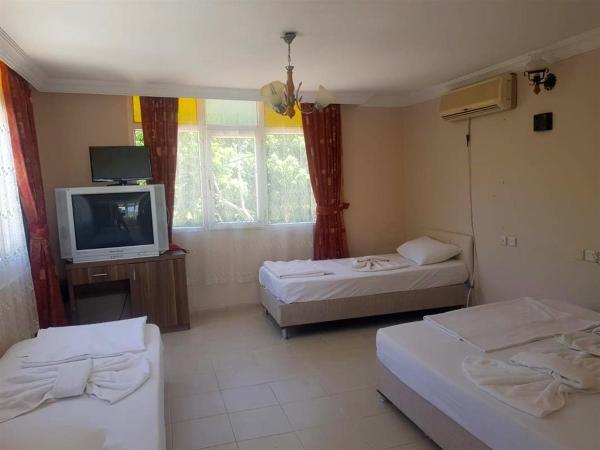 Selina Hotel : photo 4 de la chambre chambre triple - vue sur jardin