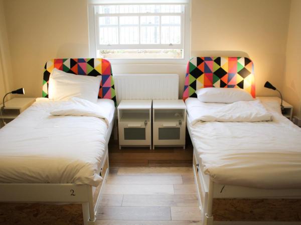 Park Villa Boutique Hostel : photo 1 de la chambre lit dans un dortoir mixte de 4 lits avec salle de bains commune