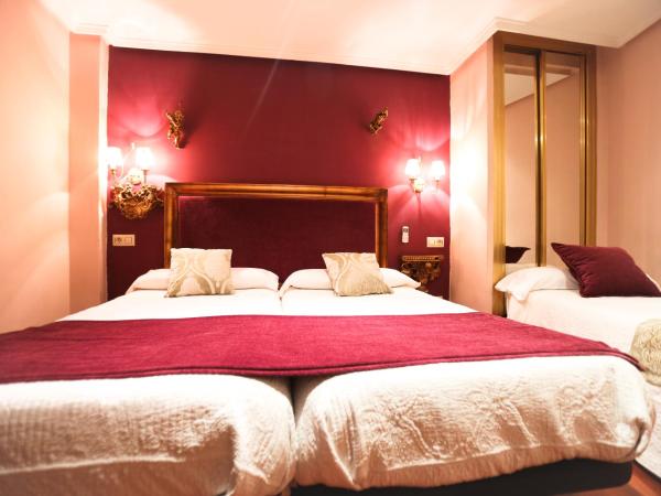 Hostal Goya Suites : photo 8 de la chambre chambre triple