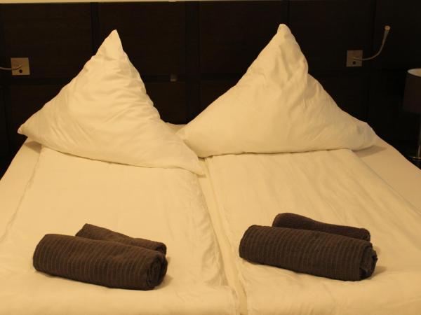 Lovely Studio Cologne West - Neues Momomotel : photo 6 de la chambre chambre double supérieure