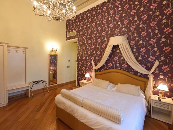 Relais La Corte di Cloris : photo 1 de la chambre suite 1 chambre avec canapé-lit