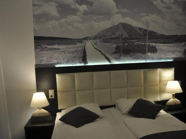 Villa Karpacz : photo 2 de la chambre chambre triple avec balcon