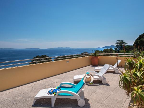 Hôtel-Club du Domaine d'Aiguebelle, USSIM Vacances : photo 7 de la chambre chambre double deluxe avec balcon - vue sur mer