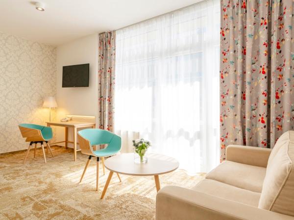 Hotel Metropol : photo 2 de la chambre chambre familiale (2 adultes et 2 enfants)