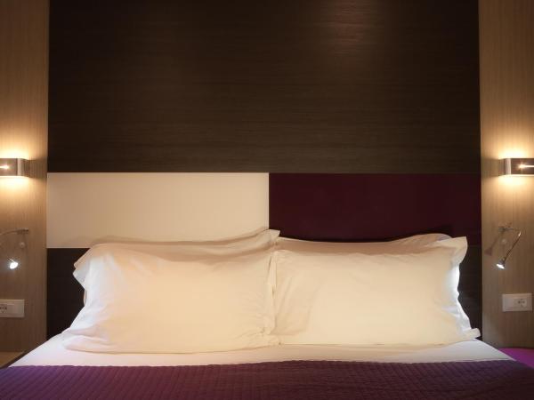 Genius Hotel Downtown : photo 6 de la chambre chambre double ou lits jumeaux