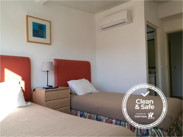 Discovery Apartment Expo : photo 10 de la chambre chambre lits jumeaux avec salle de bains privative