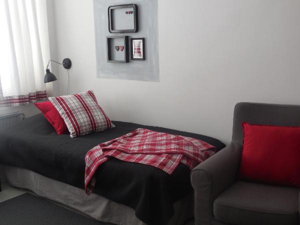 Tapulitalo Guesthouse : photo 1 de la chambre chambre lits jumeaux avec salle de bains commune